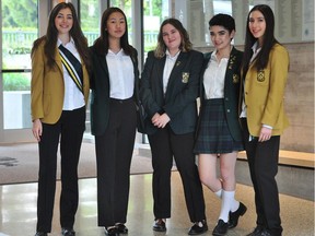 From left, Maggie Coval, Amanda Lim, Maren Gilbert Stewart, Ysabella Delgado and Kira Tosefsky show off school uniform at York House School in Vancouver, which includes options for trousers starting this fall.