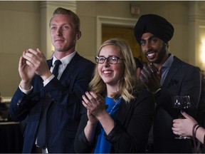 B.C. Liberal supporters applaud at a party event in downtown Vancouver on Tuesday night.