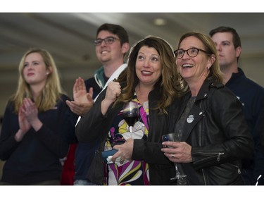 B.C. Liberal supporters watch the projected results at a party event in downtown Vancouver on Tuesday.