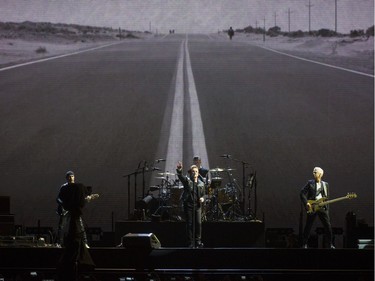 Does that street have a name? A road to somewhere is displayed on the massive video board backdrop as U2 performs to a rocking, sold out crowd in Vancouver.