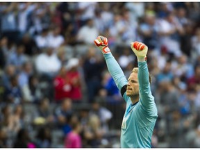 Whitecaps FC goalkeeper David Ousted celebrates the win over the Sporting KC in a regular season MLS soccer game at BC Place, Vancouver, May 20, 2017.
