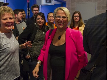 Judy Darcy smiles upon arriving at B.C. NDP headquarters in Vancouver.