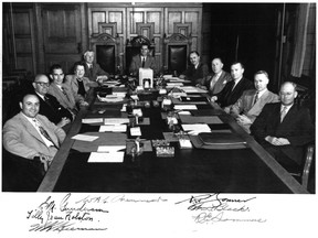 The first Social Credit cabinet in B.C. history is seated at Victoria in this 1952 file photo from the B.C. Archives. From left: Phil Gaglardi, William Ralph Chetwynd, William Kiernan, Tilly Rolston, Einar Gunderson, Premier W.A.C. Bennett, at head of the table, Robert Bonner, Wesley Black, Robert Sommers, Lyle Wicks and Eric Martin.