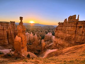 The sun rising above Thor's Hammer at Bryce Canyon National Park, Utah.