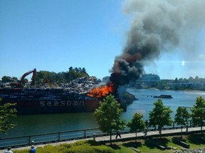 Victoria Fire Department crews are responding to a fire on a barge loaded with cars in the Gorge waterway on Friday, June 23, 2017.