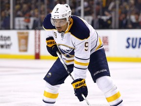 in this Feb. 6, 2016, file photo, Buffalo Sabres' Evander Kane prepares for a faceoff in the the first period of an NHL hockey game against the Boston Bruins in Boston.