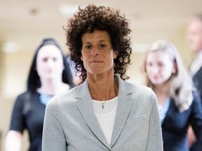 Andrea Constand walks to the courtroom during Bill Cosby&#039;s sexual assault trial at the Montgomery County Courthouse in Norristown, Pa., Tuesday, June 6, 2017. Cosby is accused of drugging and sexually assaulting Constand at his home outside Philadelphia in 2004. (AP Photo/Matt Rourke, Pool)