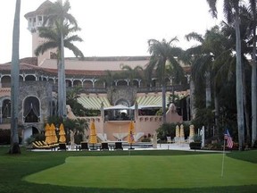 FILE - This Saturday, April 15, 2017, file photo shows President Donald Trump&#039;s Mar-a-Lago estate in Palm Beach, Fla. President Trump&#039;s decision to pull out of the Paris climate agreement could accelerate damage to his family‚Äôs real estate empire in the coming decades, especially his properties that lie just feet from the encroaching sea in low-lying South Florida. Projections from the National Oceanic and Atmospheric Administration show that Trump‚Äôs Mar-a-Lago estate, the apartment towers b