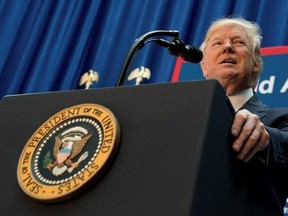 In this Friday, June 9, 2017, photo, President Donald Trump speaks on infrastructure at the Department of Transportation in Washington. Trump is expected to outline his new policy with Cuba next week, announcing steps that could reverse some of the changes made by former President Barack Obama to open commerce and travel after a half-century standoff with the communist island. (AP Photo/Andrew Harnik)