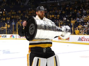 Matt Murray #30 of the Pittsburgh Penguins celebrates with the Stanley Cup Trophy after defeating the Nashville Predators 2-0 to win the 2017 NHL Stanley Cup Final at the Bridgestone Arena on June 11, 2017 in Nashville, Tennessee.