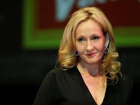 FILE - In this file photo dated Thursday, Sept. 27, 2012, British author J.K. Rowling poses for photographers during the unveiling of her new book, entitled: &#039;The Casual Vacancy&#039;, at the Southbank Centre in London. Rowling&#039;s first novel about the wizarding legend Harry Potter and the Philosopher&#039;s Stone, was published in Britain on June 26, 1997, meaning the books which spawned a series of eponymous tales has turned 20-years old. (AP Photo/Lefteris Pitarakis, FILE)