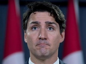 Prime Minister Justin Trudeau pauses as he speaks at a media availability at the National Press Theatre in Ottawa on Tuesday, June 27, 2017. THE CANADIAN PRESS/Justin Tang