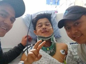 Apprentice hockey Jose Asencio keeps his spirits up at Vancouver General Hospital while recovering from a broken back suffered at Hastings Racecourse a week ago.