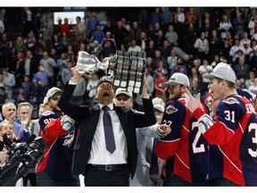 Head Coach Rocky Thompson of the Windsor Spitfires celebrates winning the championship game of the Mastercard Memorial Cup against the Erie Otters.