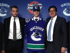 Elias Pettersson poses for photos after being selected fifth overall by the Vancouver Canucks during the 2017 NHL Draft at the United Center on June 23, 2017 in Chicago, Illinois.