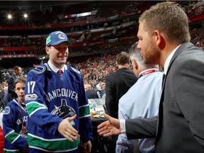 Jonah Gadjovich meets with executives after being selected 55th overall by the Vancouver Canucks during the 2017 NHL Draft at the United Center on June 24, 2017 in Chicago, Illinois.