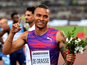 Canada's Andre de Grasse celebrates after winning the men's 200m event at the Rome meeting of the IAAF Diamond League athletics competition at the Olympic Stadium in Rome on June 8, 2017. /