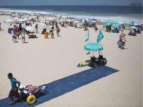 A wheelchair-accessible mat at a beach in Brazil. The mat in Vancouver will reach the low-tide line at English Bay beach.