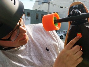 Daniel Dahlberg was riding his Boosted Board v2 down a hill in Kitsilano when he was stopped by police and fined $598 for riding a motorized skateboard on the road. Handout June 2017 [PNG Merlin Archive]