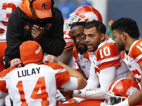 B.C. Lions quarterback Jonathon Jennings holds court with his teammates on the sidelines, an aspect of the game he'll need to expand upon if he's to be an elite quarterback.