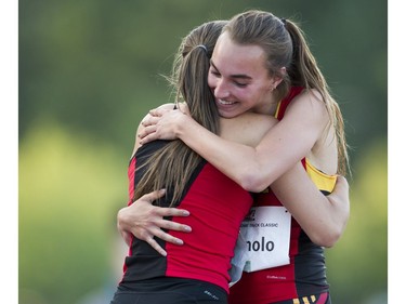 Lauren D'Agnolo gets a hug after finishing a personal best in the women's 400m event at the 2017 Vancouver Sun Harry Jerome Track Classic at the Percy Perry stadium, Coquitlam, June 28 2017.