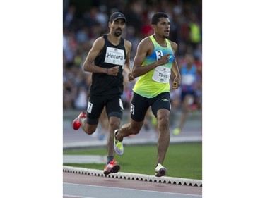 Daniel Herrera ( L ) and Izaic Yorks run in the 1500m mens event at the 2017 Vancouver Sun Harry Jerome Track Classic at the Percy Perry stadium, Coquitlam, June 28 2017.