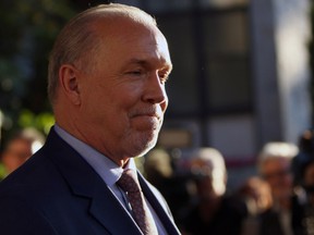 NDP leader and Premier-designate John Horgan makes a brief statement and answers questions from the media after meeting with Lt.-Gov. Judith Guichon at the Government House in Victoria, B.C., on Thursday, June 29, 2017.