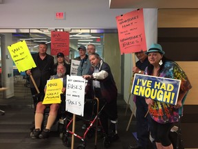 HandyDART users and employees protest at a TransLink board of directors meeting on June 23. A class action suit about the levels of transit service for disabled passengers was launched on Thursday.