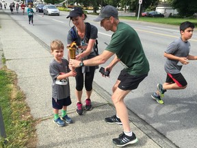 There were a lot of highlights and fun moments during the 27th annual Abbotsford Police Challenge Run on Saturday, but this torch hand-off was pretty special.