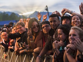 American hip hop artist J. Cole performing on the Pemberton Stage at the Pemberton Music Festival.