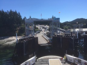 B.C. Ferries is offering free reservations on the Tsawwassen-Swartz Bay route for people travelling to Mayne Island in the next few days after hundreds of weekend travellers were caught in a massive traffic jam as they tried to leave the island on Sunday. Village Bay ferry terminal at Mayne Island is shown in this file photo.