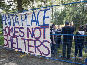 Maple Ridge fire and RCMP  check on the situation at Anita Place homeless camp on 223rd Street in Maple Ridge, BC Tuesday, May 2, 2017 to ensure the safety of the campers.