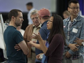 People discuss housing options at a City of Vancouver roundtable on Saturday, June 17, 2017 at the Hillcrest curling rink. The event allowed citizens to comment on housing affordability and to discuss possible solutions.