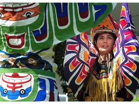 Mique'l Dangeli of the Git Hayetsk Dance group performs during National Aboriginal Day at Trout Lake with a community-based, full day of events set to showcase and celebrate the diversity of Indigenous people across Canada, in Vancouver on Wednesday, June 21, 2017.