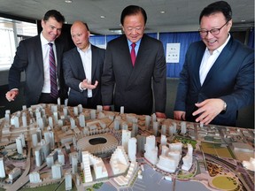 Canadian Metropolitan Properties Corp. owner Oei Hong Leong (second from right) with (from left) Kevin Hoffman, Daisen Gee-Wing and project architect James Cheng.