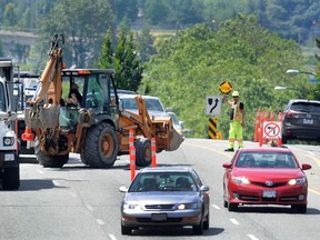 Roadwork slows traffic on Grandview Highway between Rupert and Boundary Road on Sunday, June 25.
