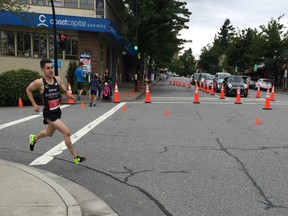 Bilal Shamsi of Surrey turns on to Marine Drive during Saturday's West Van Run Ambleside Mile. Shamsi finished second with an amazing time of 4:35, 10 seconds behind winner Joshua Potvin of Vancouver.