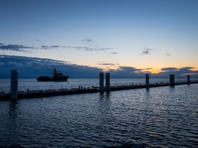 The fishing vessel Ocean Pearl heads out to sea at dusk in Richmond on Feb. 27.