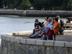 Relaxing along the Stanley Park seawall is very hygge. Glass and concrete towers rising across the city are most un-hygge.