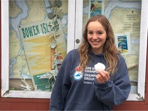 Emily Epp, 17, holds a shell she found on her swim around Bowen Island, B.C. on Saturday June 17, 2017.
