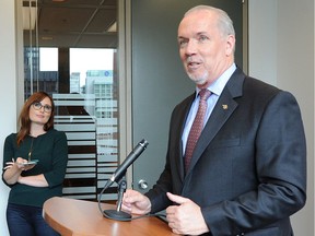 NDP Leader John Horgan has advised BC Hydro not to sign any new contracts on the divisive Site C hydroelectric dam project.