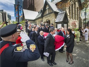 Grace McCarthy's casket is brought out of Christ Church Cathedral Wednesday during the funeral in Vancouver.