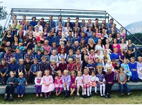 A photo of 124 of Winston Blackmore's children taken more than a year ago. With three babies born recently, Blackmore now has 148 children.