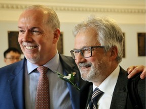 NDP leader and premier-designate John Horgan with his new chief of staff, former Vancouver city councillor Geoff Meggs, at the legislature on June 8.