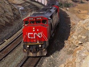 A February 2011 handout of a CN coal train near Jasper, Alta. The past was typified by innovative government efforts to provide needed transportation, communication and energy infrastructure to span our vast country, including the Canadian National Railway.