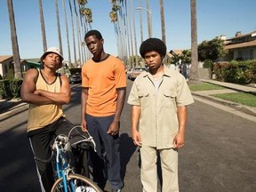 This image released by FX shows Malcolm Mays as Kevin, from left, Damson Idris as Franklin Saint and Isaiah John as Leon on FX‚Äôs new series ‚ÄúSnowfall.‚Äù The first season premieres Wednesday, July 5, 2017. (Mark Davis/FX via AP)