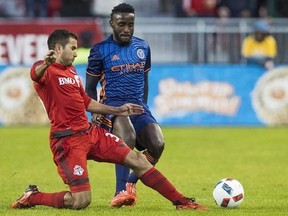 Toronto FC Toronto FC Steven Beitashour, left, kicks the ball against New York City FC Stiven Mendoza during the first half of MLS soccer action in Toronto, Wednesday May 18, 2016. Beitashour dropped into the Toronto FC training centre Tuesday, his first visit since undergoing surgery for a damaged pancreas. THE CANADIAN PRESS/Mark Blinch