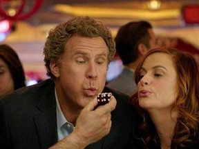 This image released by Warner Bros Pictures shows Will Ferrell, left, and Amy Poehler in a scene from, &ampquot;The House.&ampquot; The film opened with just $8.7 million, the latest in an increasingly long line of comedy flops at the box office. (Warner Bros. Entertainment via AP)