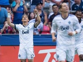 Vancouver Whitecaps&#039; Fredy Montero, back left, celebrates his goal against New York City FC during first half MLS action in Vancouver, B.C., on Wednesday July 5, 2017. Montero smiled and let out an exaggerated sigh when asked what the Vancouver Whitecaps need to do to end their Lone Star State misery. THE CANADIAN PRESS/Darryl Dyck