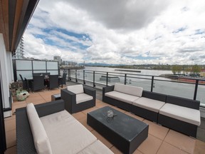 This home at 401 - 220 Salter Street, New Westminster offers sweeping views of the Fraser River. It has three bedrooms and two bathrooms.